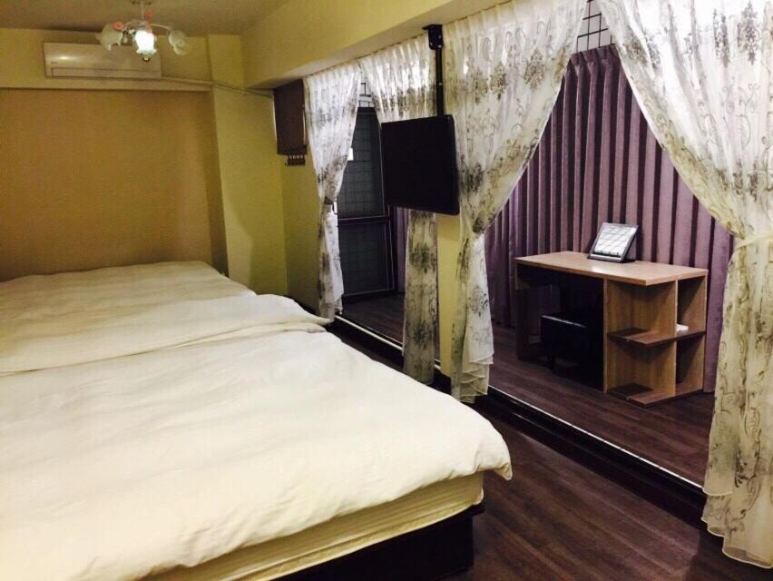Love Feng Jia Apartment Hotel Тайджун Екстериор снимка
